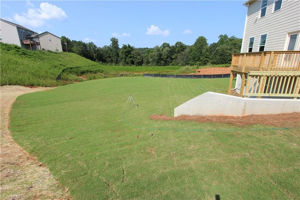 4 bedroom, 3 bathroom, 2,428 sq ft single family residence for sale at 7431 Rocklin Lane, Flowery Branch, GA 30542 — photo 5