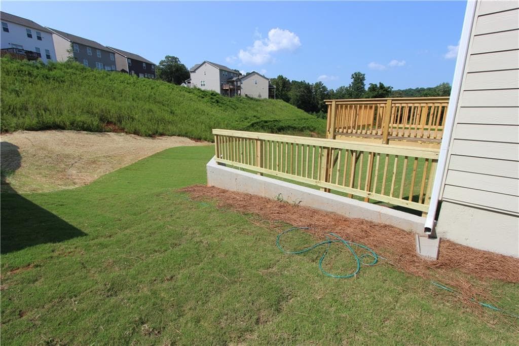 4 bedroom, 3 bathroom, 2,428 sq ft single family residence for sale at 7431 Rocklin Lane, Flowery Branch, GA 30542 — photo 6