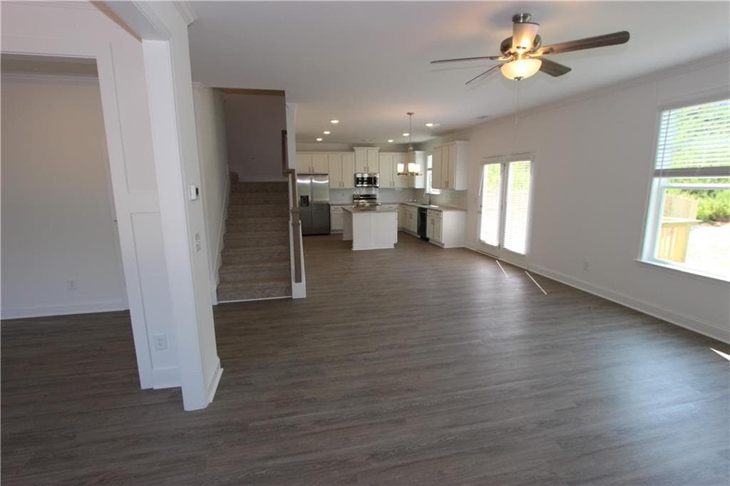 4 bedroom, 3 bathroom, 2,428 sq ft single family residence for sale at 7431 Rocklin Lane, Flowery Branch, GA 30542 — photo 9