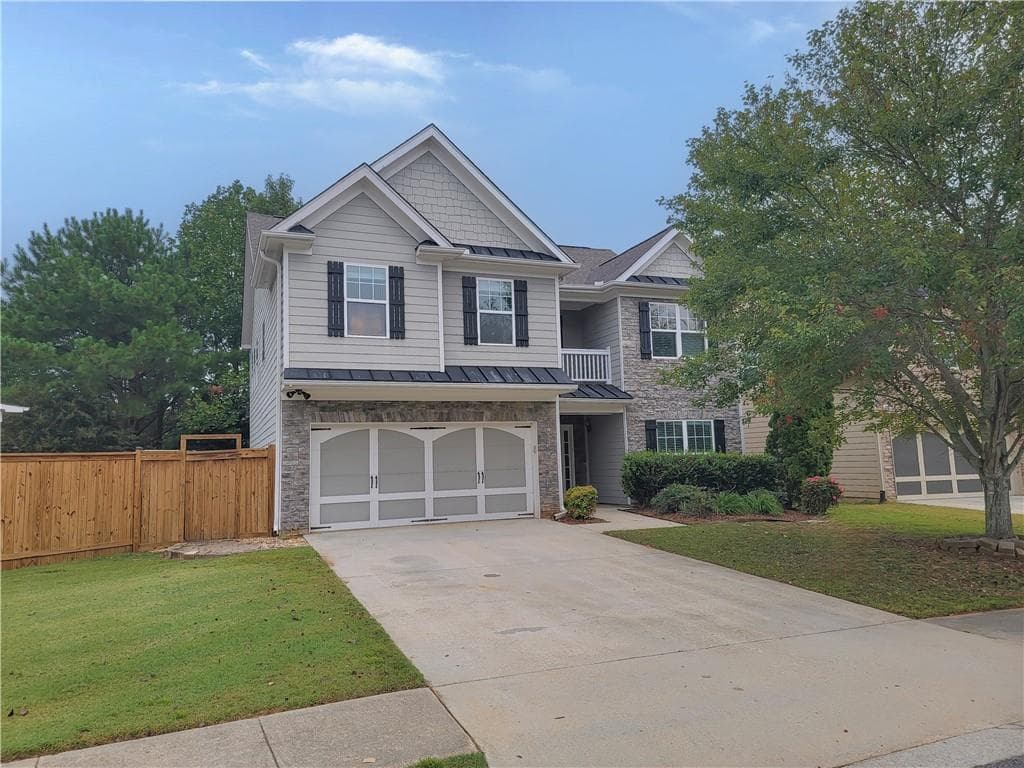5 bedroom, 3 bathroom, 2,708 sq ft single family residence for sale at 908 Upland Ives Drive, Buford, GA 30518 — photo 2