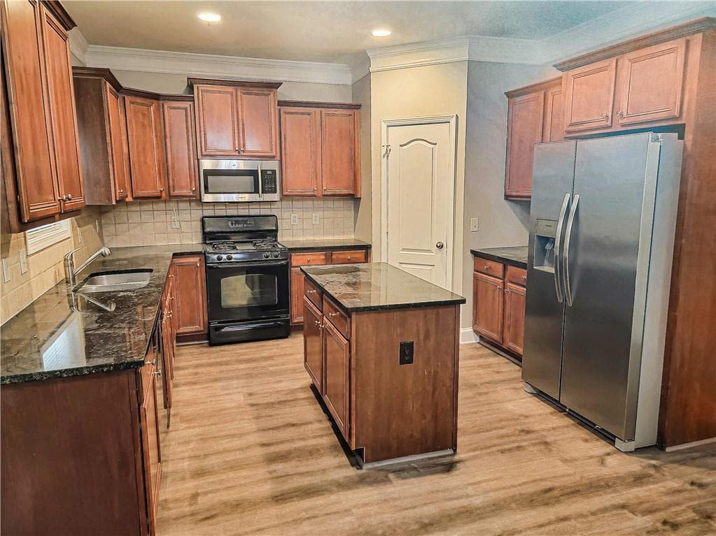 5 bedroom, 3 bathroom, 2,708 sq ft single family residence for sale at 908 Upland Ives Drive, Buford, GA 30518 — photo 9