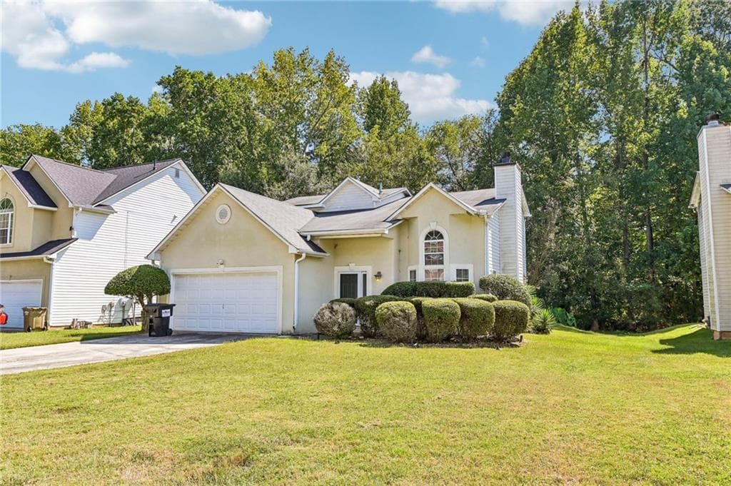 3 bedroom, 3 bathroom, 2,062 sq ft single family residence for sale at 1117 W Shore Drive, Riverdale, GA 30296