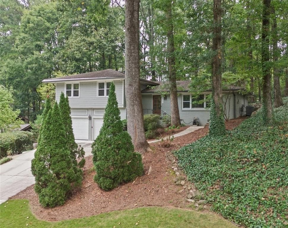 4 bedroom, 3 bathroom, 2,075 sq ft single family residence for sale at 2477 Midvale Court, Tucker, GA 30084 — photo 2