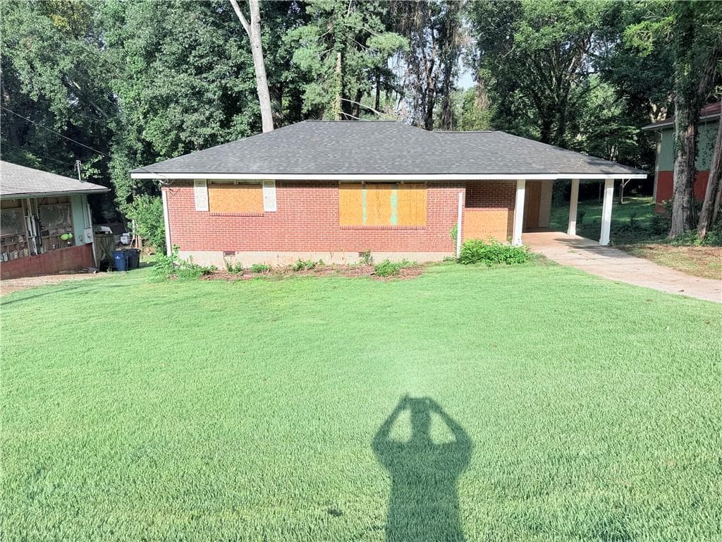 2 bedroom, 1 bathroom, 1,055 sq ft single family residence for sale at 2879 Rockwood Road, East Point, GA 30344
