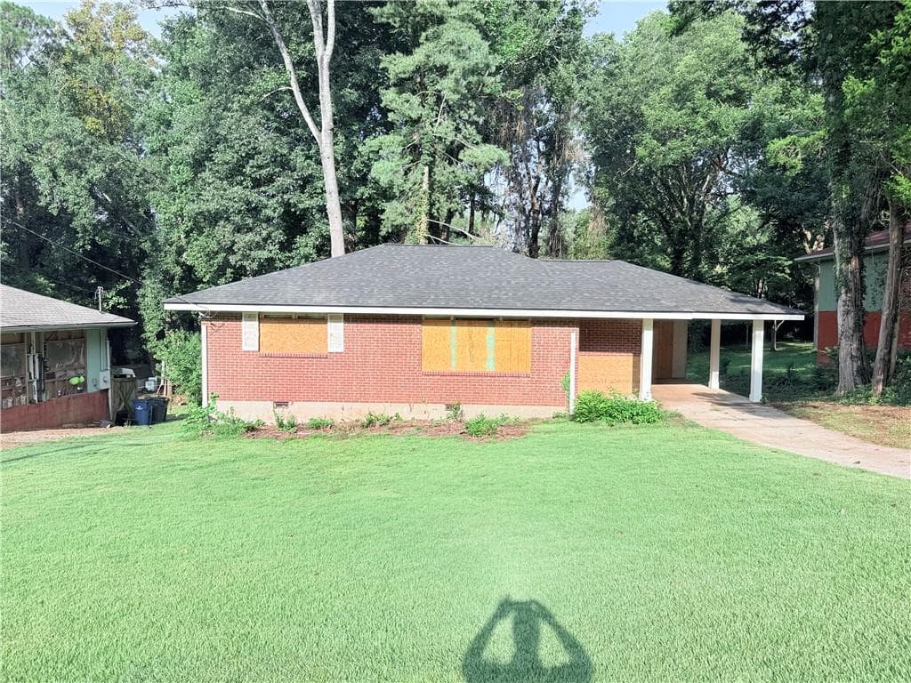 2 bedroom, 1 bathroom, 1,055 sq ft single family residence for sale at 2879 Rockwood Road, East Point, GA 30344 — photo 2