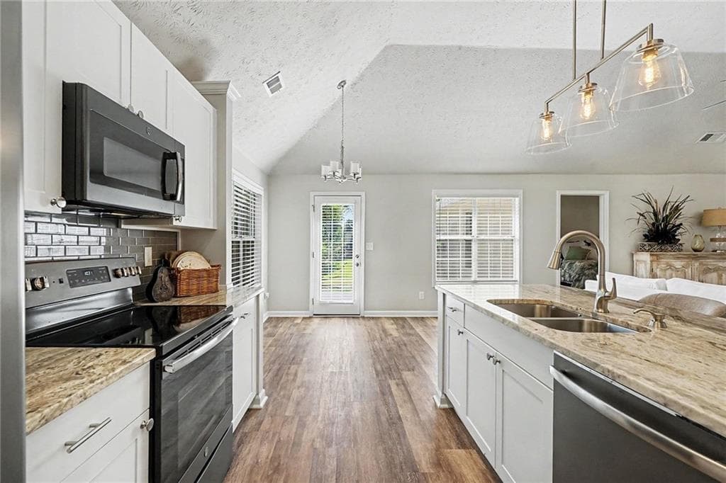 4 bedroom, 2 bathroom, 1,508 sq ft single family residence for rent at 1545 Quail Point Run, Hoschton, GA 30548 for $2,400 a month — photo 3