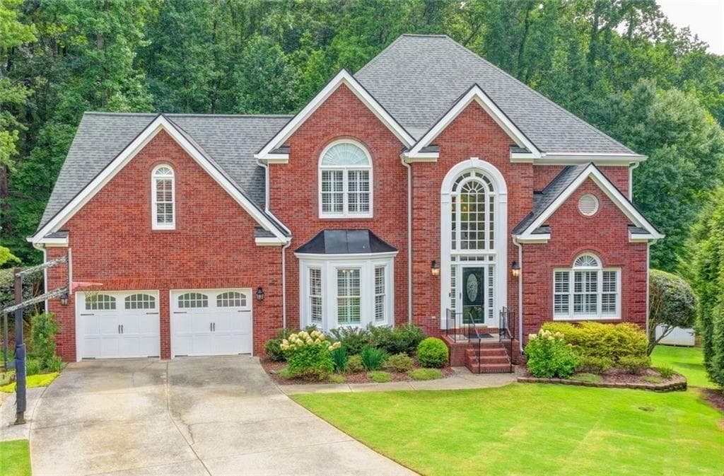 6 bedroom, 5 bathroom, 5,670 sq ft single family residence for sale at 4614 Kiplin Lake Court, Sugar Hill, GA 30518