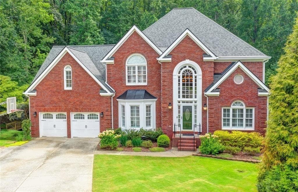 6 bedroom, 5 bathroom, 5,670 sq ft single family residence for sale at 4614 Kiplin Lake Court, Sugar Hill, GA 30518 — photo 2