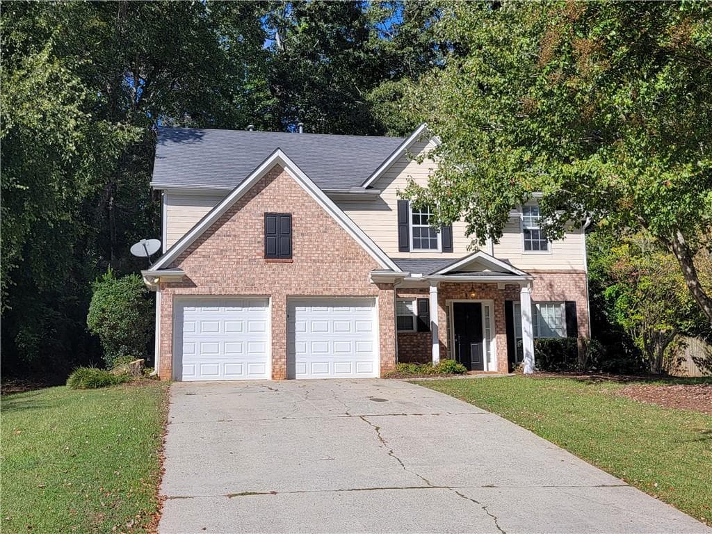 4 bedroom, 3 bathroom, 2,047 sq ft single family residence for sale at 5855 Rives Drive, Alpharetta, GA 30004 — photo 2