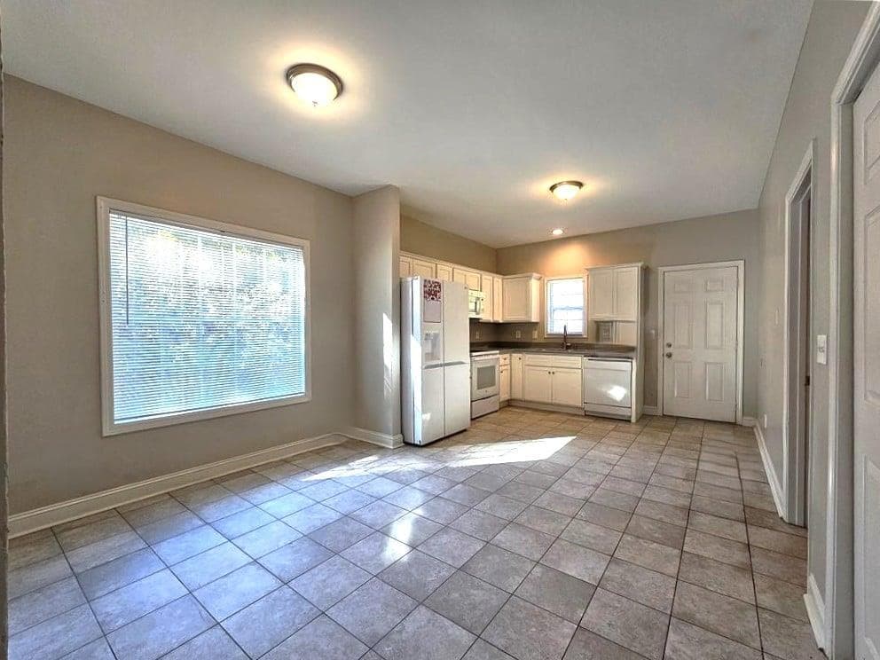 4 bedroom, 3 bathroom single family residence for rent at 718 N Evelyn Place, Atlanta, GA 30318 for $2,200 a month — photo 3