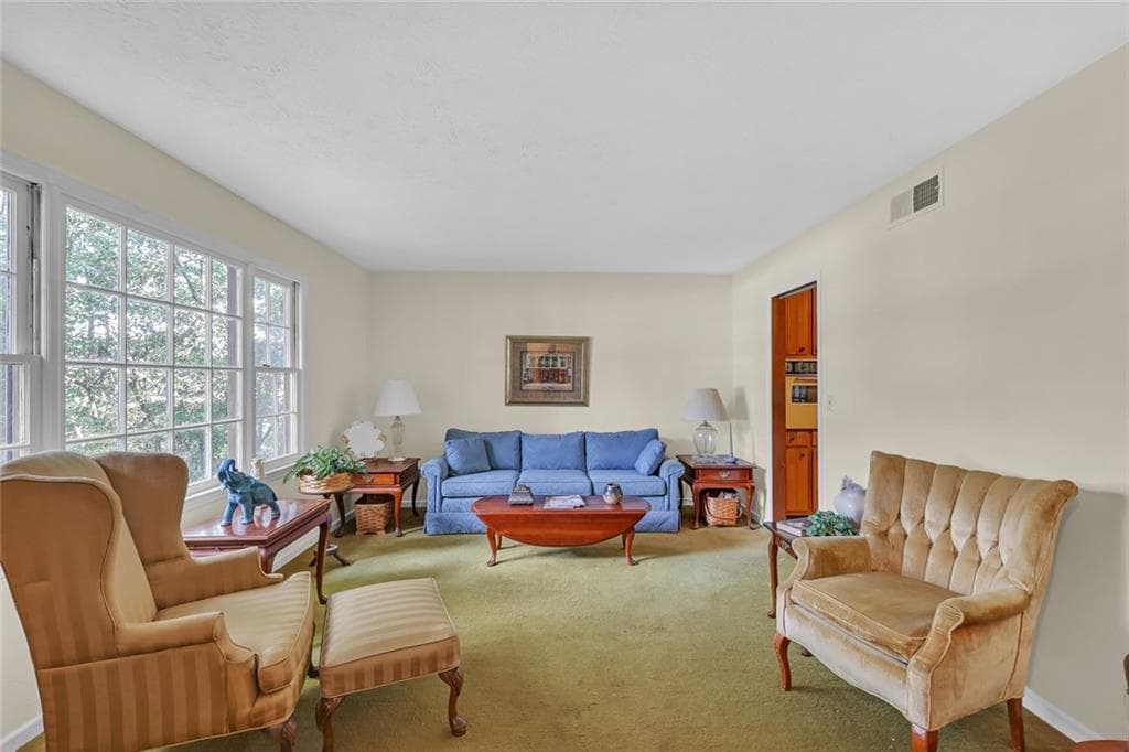 3 bedroom, 2 bathroom, 2,796 sq ft single family residence for sale at 1466 Hewatt Road, Lilburn, GA 30047 — photo 4