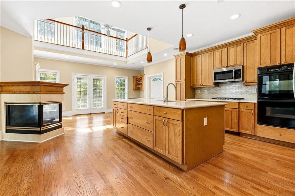 6 bedroom, 7 bathroom, 5,766 sq ft single family residence for sale at 205 Standing Oak Place, Fayetteville, GA 30214 — photo 9