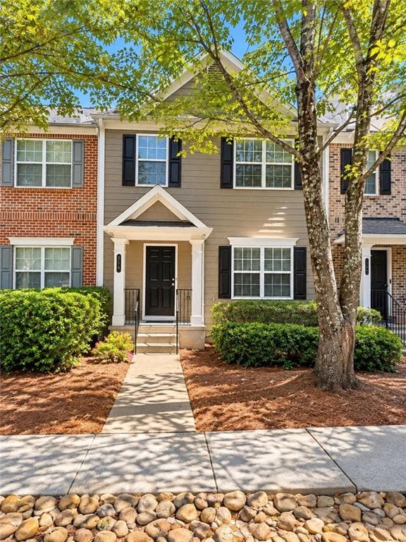 4 bedroom, 3 bathroom, 1,870 sq ft townhouse for sale at 724 Breeze Lane, Woodstock, GA 30188 — photo 2