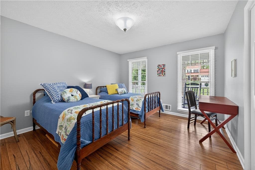 4 bedroom, 2 bathroom, 2,110 sq ft single family residence for sale at 176 Arbour Run, Suwanee, GA 30024 — photo 8
