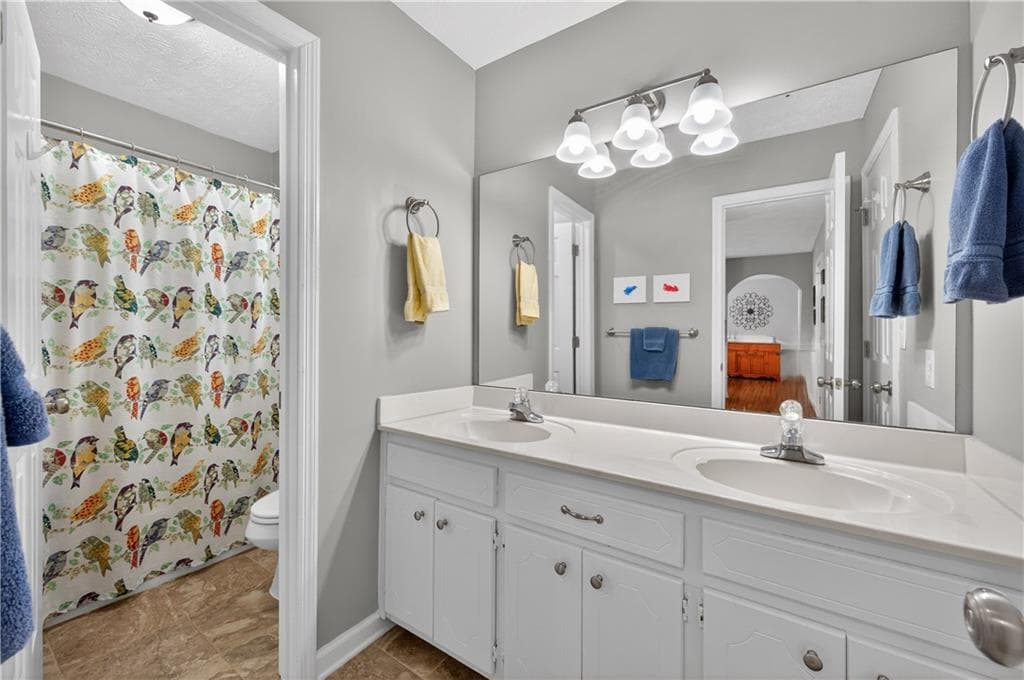 4 bedroom, 2 bathroom, 2,110 sq ft single family residence for sale at 176 Arbour Run, Suwanee, GA 30024 — photo 9