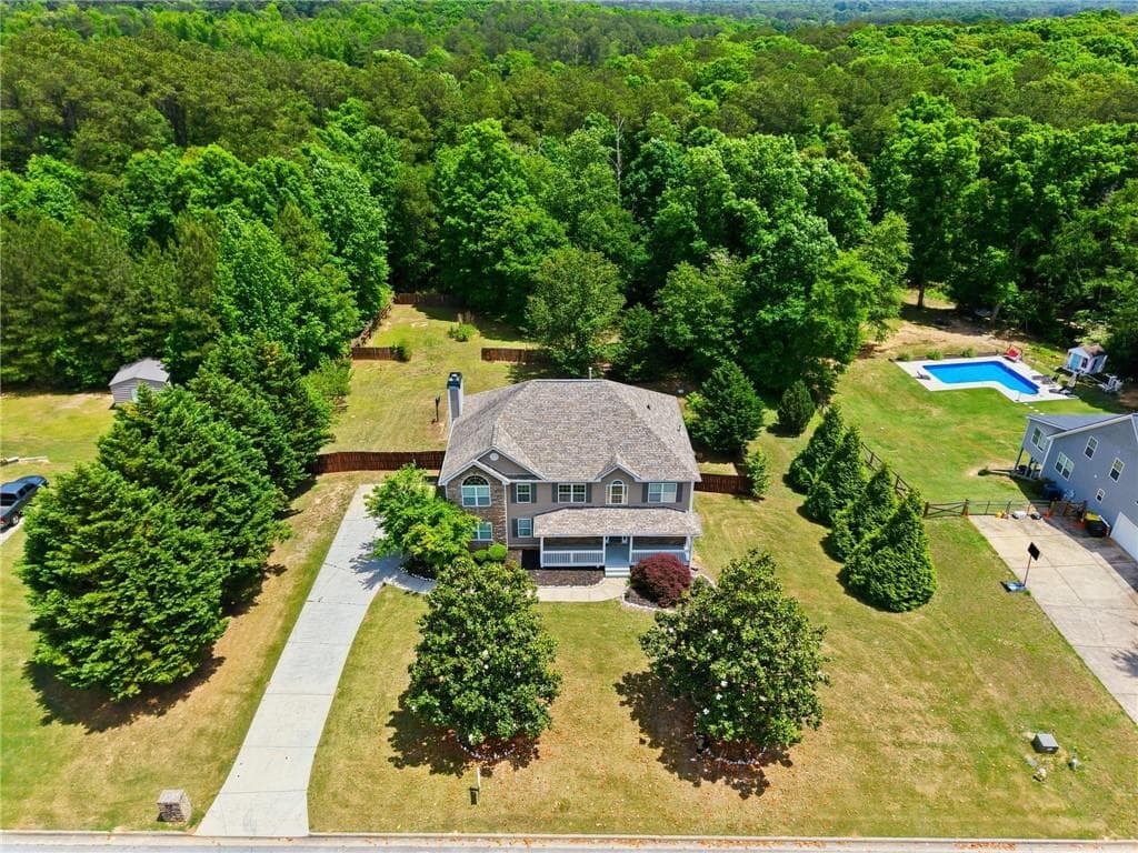 5 bedroom, 5 bathroom, 4,753 sq ft single family residence for sale at 65 Ashford Drive, Oxford, GA 30054 — photo 2