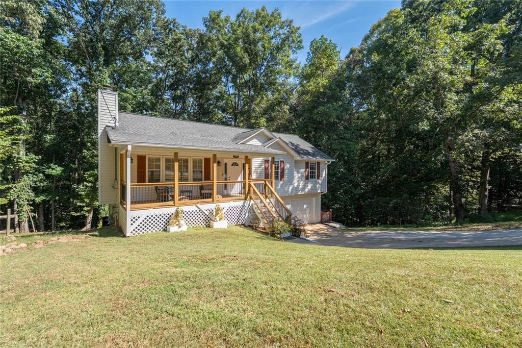 4 bedroom, 2 bathroom, 1,884 sq ft single family residence for sale at 1590 Kimberly Place, Canton, GA 30114 — photo 2