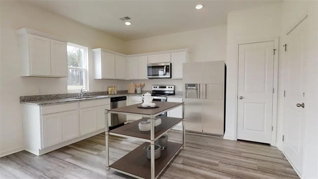 4 bedroom, 3 bathroom, 1,801 sq ft single family residence for sale at 302 Knightsbridge Lane, Winder, GA 30680 — photo 7