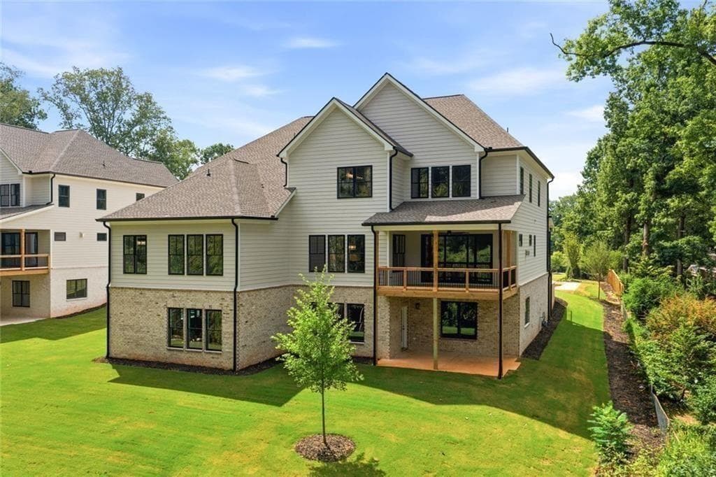 6 bedroom, 6 bathroom, 7,035 sq ft single family residence for sale at 1976 Highgrove Court, Atlanta, GA 30345 — photo 2