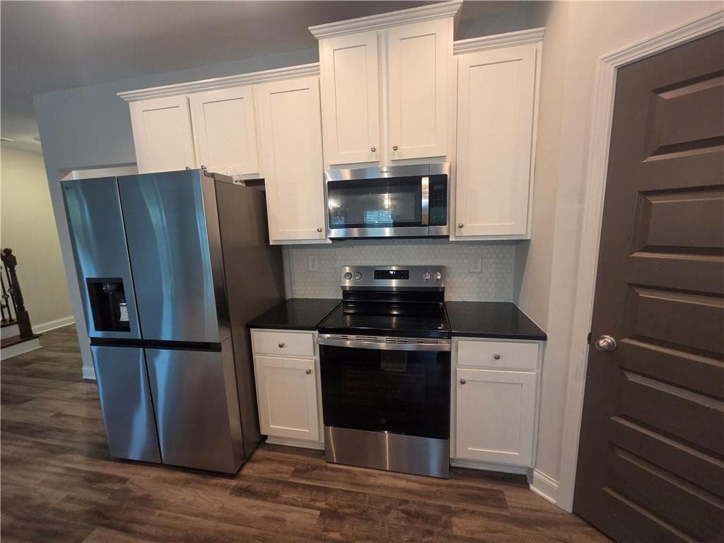4 bedroom, 3 bathroom, 2,409 sq ft single family residence for sale at 631 Omnia Court, Lawrenceville, GA 30044 — photo 8