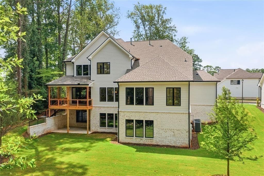 6 bedroom, 6 bathroom, 7,030 sq ft single family residence for sale at 1992 Highgrove Court, Atlanta, GA 30345 — photo 2