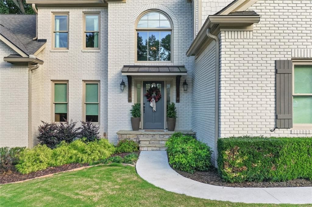 6 bedroom, 5 bathroom, 4,232 sq ft single family residence for sale at 2235 Brickton Station, Buford, GA 30518 — photo 2