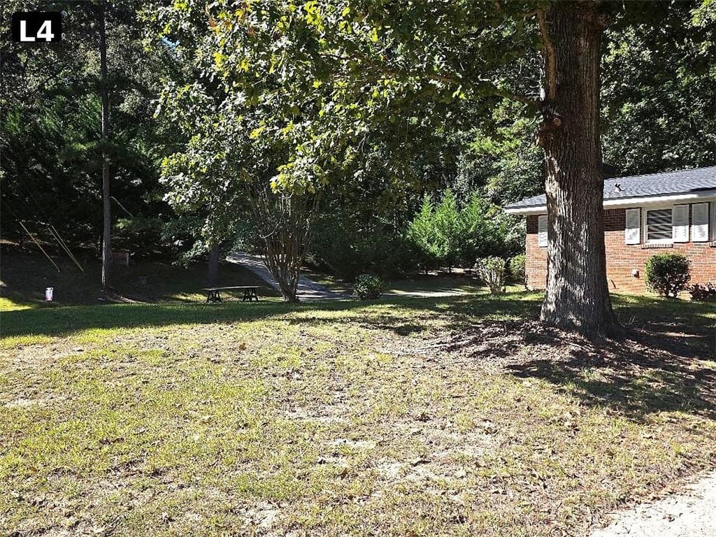 3 bedroom, 2 bathroom, 1,800 sq ft single family residence for sale at 411 Dewberry Lane, Lindale, GA 30147 — photo 5