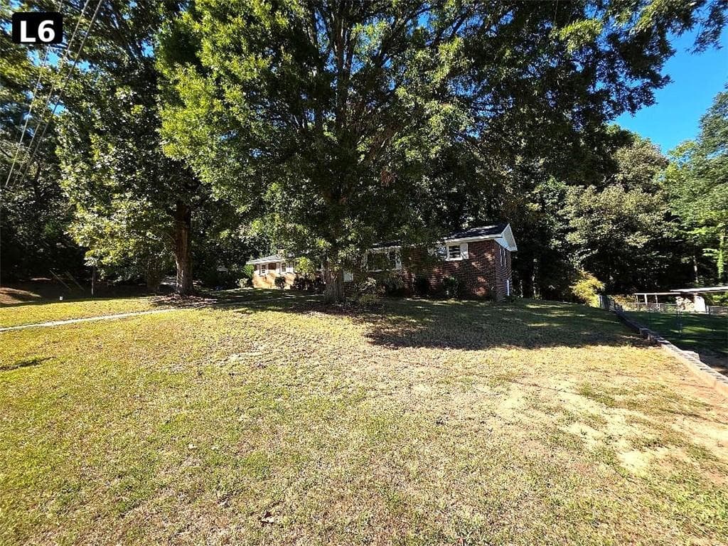3 bedroom, 2 bathroom, 1,800 sq ft single family residence for sale at 411 Dewberry Lane, Lindale, GA 30147 — photo 7