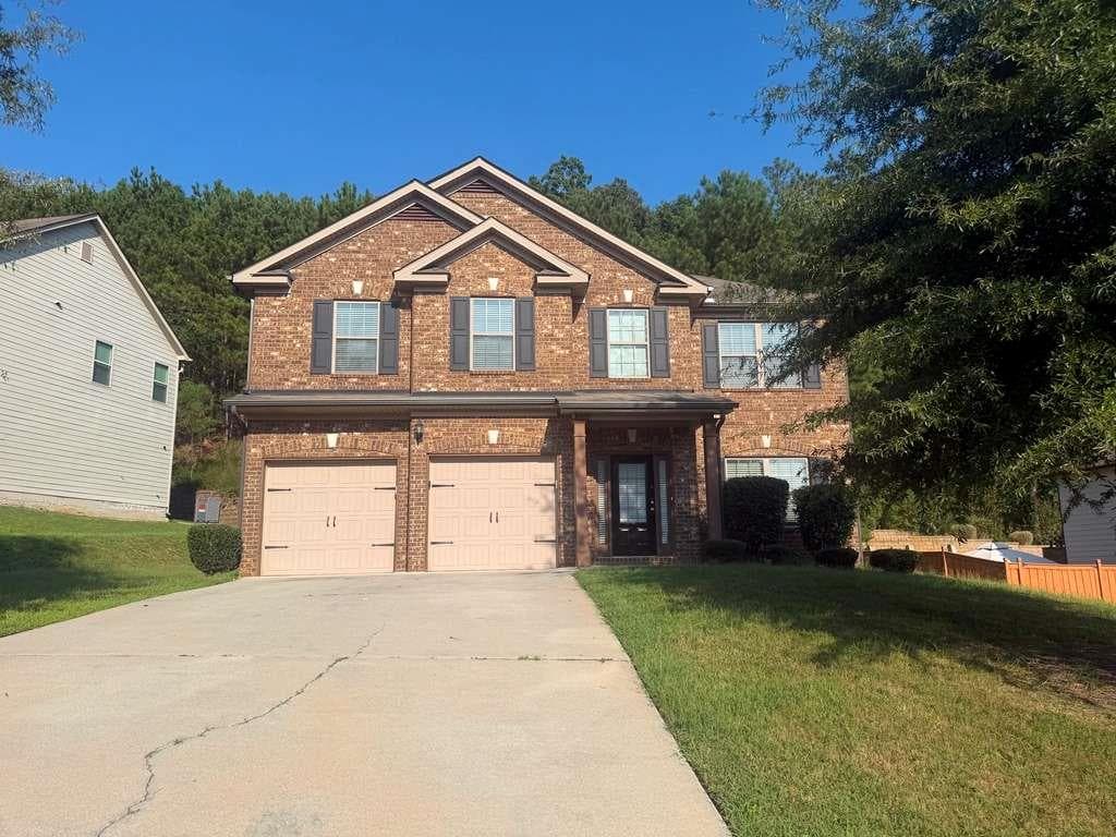 4 bedroom, 3 bathroom, 2,380 sq ft home for sale at 5010 Tower View Trail, Snellville, GA