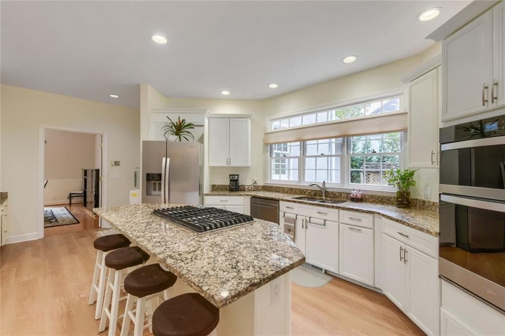 6 bedroom, 6 bathroom, 6,124 sq ft single family residence for sale at 5830 Plantation Drive, Roswell, GA 30075 — photo 7