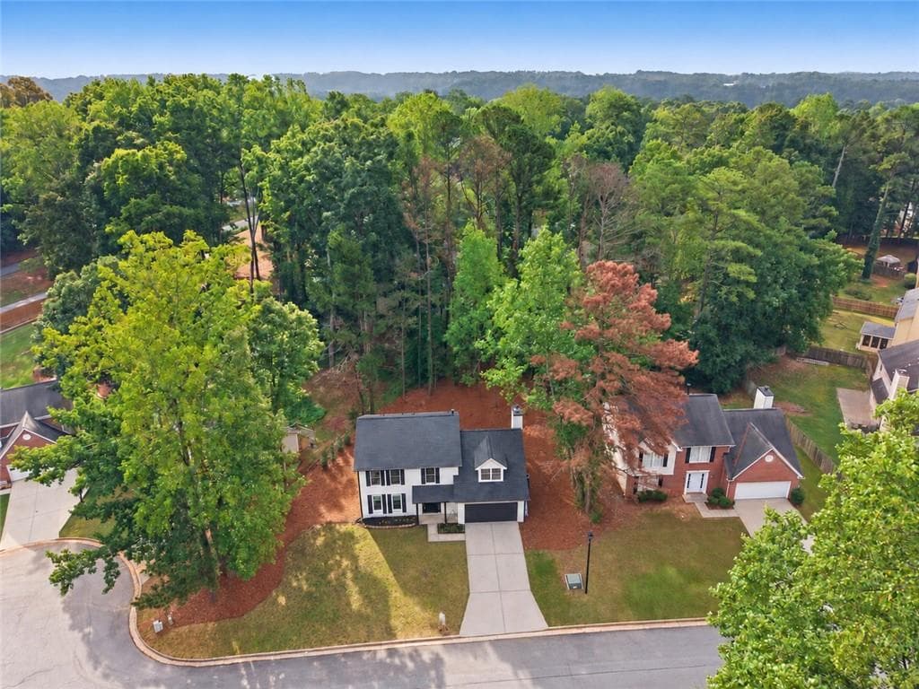 4 bedroom, 3 bathroom, 2,120 sq ft single family residence for sale at 1738 Wedgewood Drive, Stone Mountain, GA 30088 — photo 2