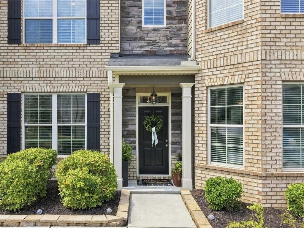 6 bedroom, 4 bathroom, 3,977 sq ft single family residence for sale at 2660 Ogden Trail, Buford, GA 30519 — photo 2