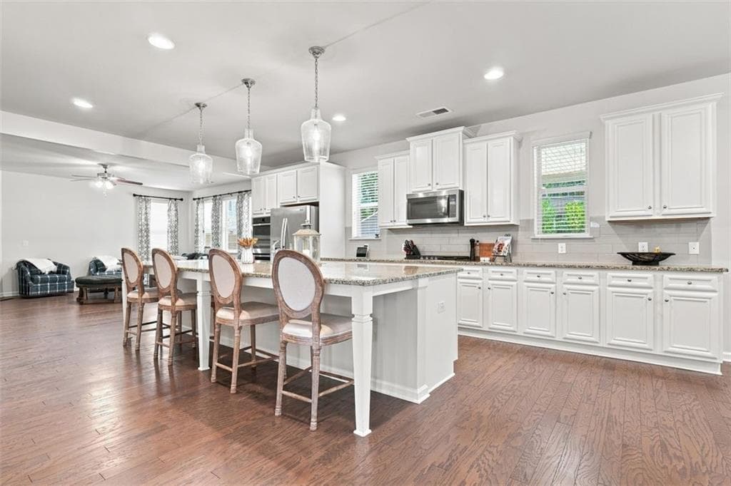 6 bedroom, 4 bathroom, 3,977 sq ft single family residence for sale at 2660 Ogden Trail, Buford, GA 30519 — photo 7