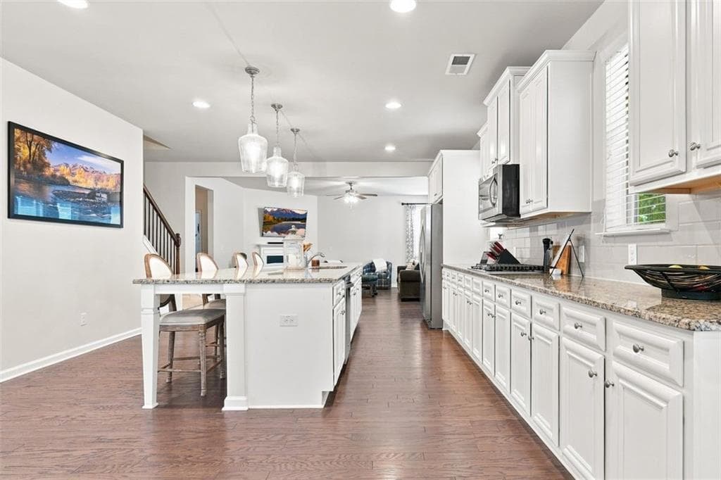 6 bedroom, 4 bathroom, 3,977 sq ft single family residence for sale at 2660 Ogden Trail, Buford, GA 30519 — photo 9