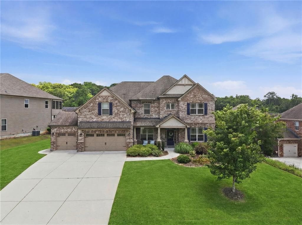 5 bedroom, 4 bathroom, 3,820 sq ft single family residence for sale at 4863 Highland Wood Drive, Auburn, GA 30011 — photo 2