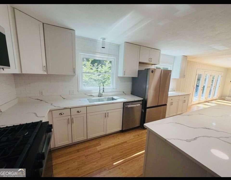 4 bedroom, 4 bathroom, 2,596 sq ft single family residence for sale at 5314 High Harbor Court, Gainesville, GA 30504 — photo 8