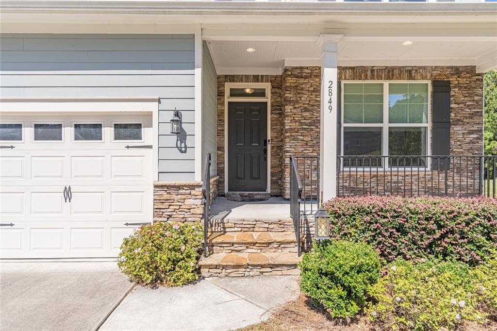 6 bedroom, 5 bathroom, 4,507 sq ft single family residence for sale at 2849 Windsor Knoll Drive, Dacula, GA 30019 — photo 5