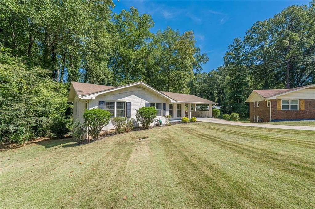 4 bedroom, 3 bathroom, 2,892 sq ft single family residence for sale at 2670 Kelly Lake Court, Decatur, GA 30032 — photo 3