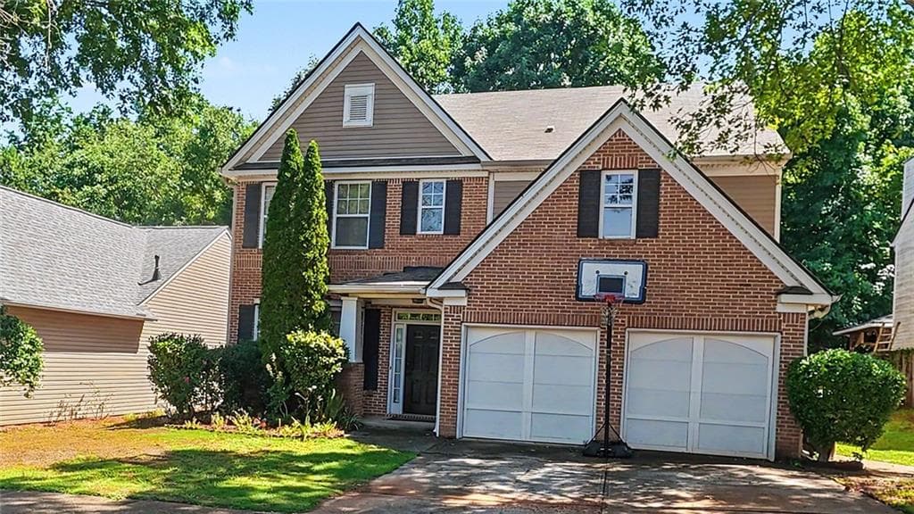 5 bedroom, 3 bathroom, 2,700 sq ft single family residence for sale at 6699 Island Pointe Drive, Buford, GA 30518 — photo 2