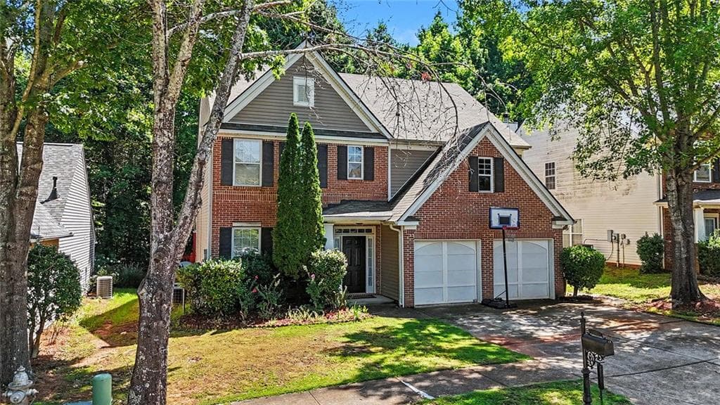 5 bedroom, 3 bathroom, 2,700 sq ft single family residence for sale at 6699 Island Pointe Drive, Buford, GA 30518 — photo 3