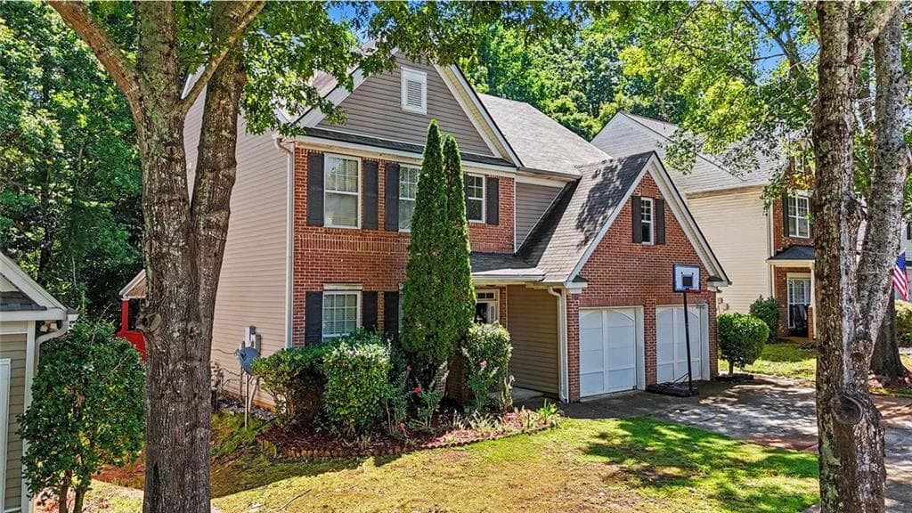 5 bedroom, 3 bathroom, 2,700 sq ft single family residence for sale at 6699 Island Pointe Drive, Buford, GA 30518 — photo 5