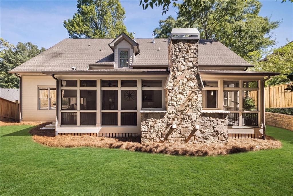 6 bedroom, 7 bathroom, 6,049 sq ft single family residence for sale at 2872 Parkridge Drive, Atlanta, GA 30319 — photo 2