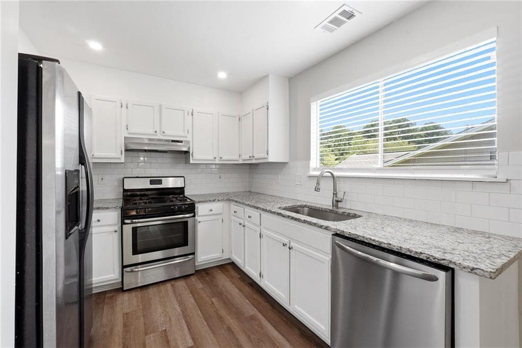 4 bedroom, 2 bathroom, 1,780 sq ft single family residence for sale at 8413 Glenwoods Terrace, Riverdale, GA 30274 — photo 4