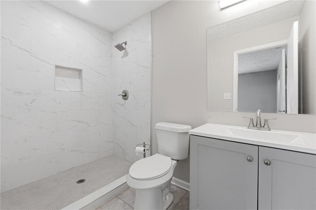 4 bedroom, 2 bathroom, 1,780 sq ft single family residence for sale at 8413 Glenwoods Terrace, Riverdale, GA 30274 — photo 6