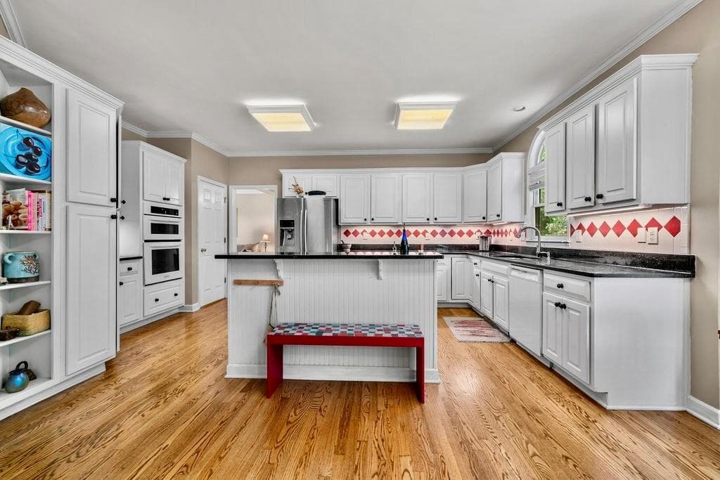 6 bedroom, 4 bathroom, 4,504 sq ft single family residence for sale at 3957 Bellingrath Main, Kennesaw, GA 30144 — photo 9