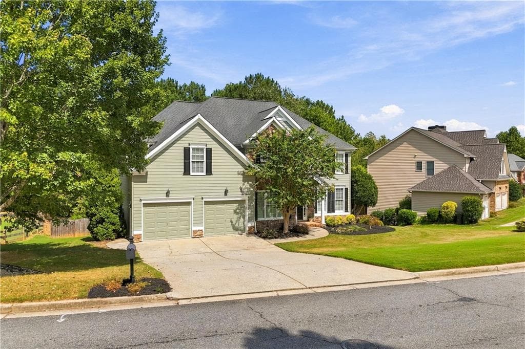 5 bedroom, 4 bathroom, 4,059 sq ft single family residence for sale at 5205 Millwood Drive, Canton, GA 30114 — photo 2