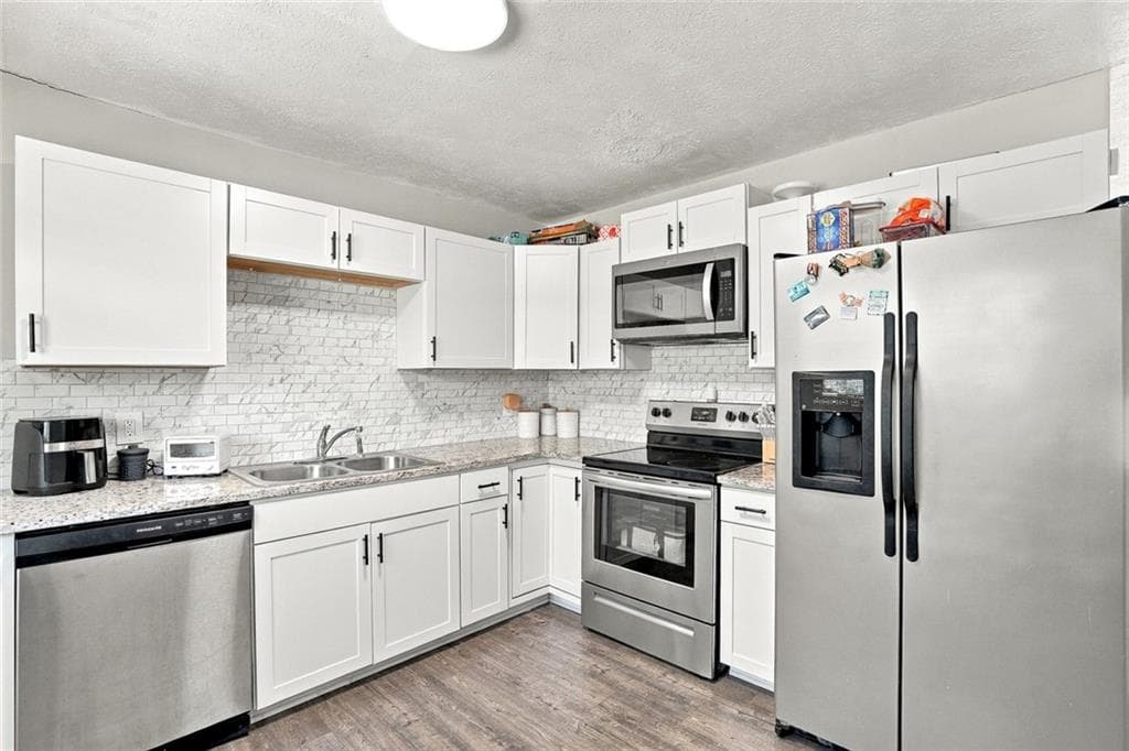 3 bedroom, 2 bathroom, 1,054 sq ft single family residence for sale at 8570 Kennesaw Court, Jonesboro, GA 30238 — photo 7
