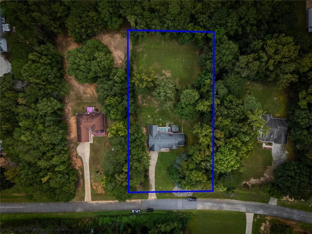 3 bedroom, 2 bathroom, 1,550 sq ft single family residence for sale at 405 Jordan Lane, Locust Grove, GA 30248 — photo 3