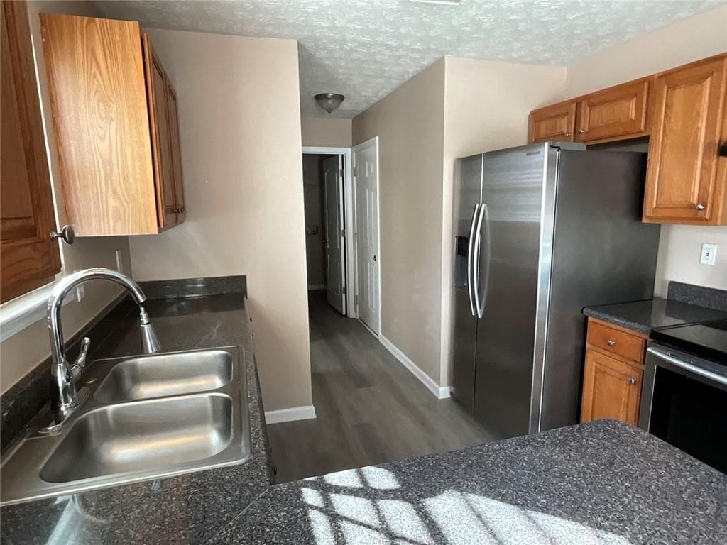4 bedroom, 3 bathroom, 1,718 sq ft single family residence for sale at 2043 Newton Estates, Ellenwood, GA 30294 — photo 7