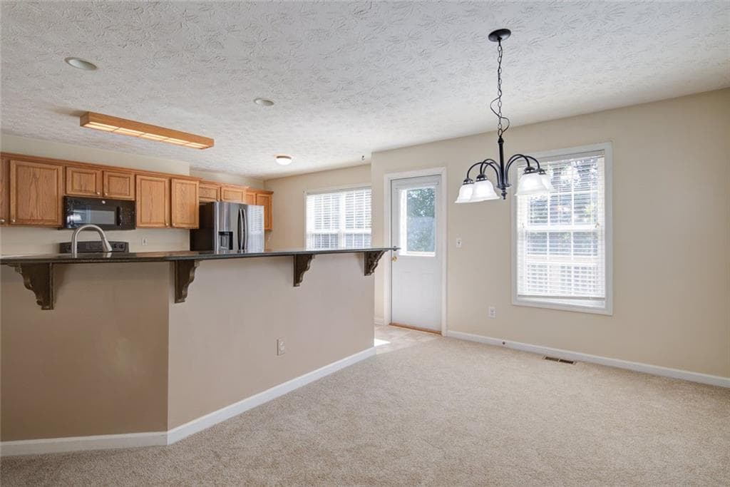 4 bedroom, 4 bathroom, 1,881 sq ft single family residence for sale at 6960 N Glen Drive, Cumming, GA 30028 — photo 9